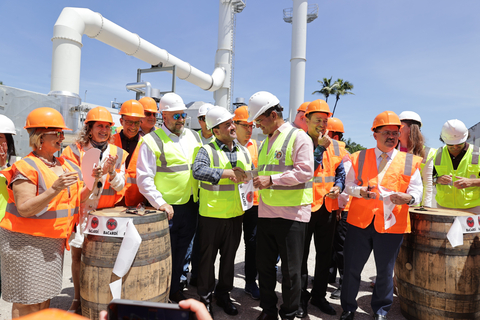 Edwin Zayas, VP of Operations Bacardi Corporation (center left), with Puerto Rico Governor Pedro Pierluisi (center right) at the ribbon cutting ceremony for a new CHP system at the Bacardi rum distillery in Puerto Rico. (Photo: Business Wire)