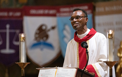 The dean of Jesuit School of Theology of Santa Clara University, A.E. Orobator, S.J., giving a homily at Santa Clara University's Mission Church. Photo by Jim Gensheimer. (Photo: Business Wire)