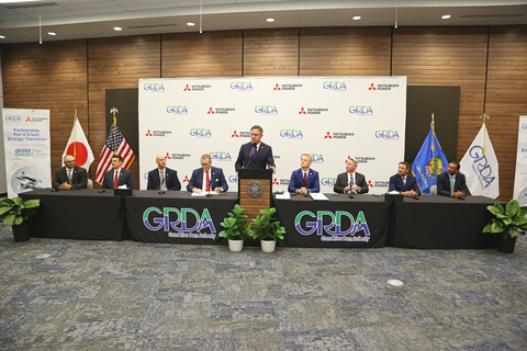 Grand River Dam Authority, Mitsubishi Power, and Oklahoma Secretary of State Josh Cockroft at the signing ceremony held at the Grand River Energy Center in Chouteau, OK. Pictured from left to right: Robert Ladd, VP of Generation, GRDA; Erik Feighner, Chief Financial Officer, GRDA; Dwayne Elam, GRDA Board Member; Dan Sullivan, President and CEO GRDA; John Wiscaver, EVP Strategic Communications, GRDA; Josh Cockroft, Oklahoma Secretary of State; Bill Newsom, President and CEO Mitsubishi Power Americas; Mark Bissonnette, EVP and COO, Power Generation, Mitsubishi Power Americas; Prasanth Thupili, SVP, Power Generation Services, Mitsubishi Power Americas (Credit: Grand River Dam Authority)