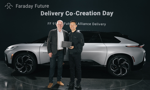 FF’s Global CEO, Matthias Aydt (L) hands over a FF 91 2.0 Futurist Alliance to Mr. YT Jia (R) at a “Delivery Co-Creation Day” Event at FF’s headquarters in Los Angeles. (Photo: Business Wire)