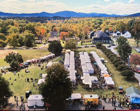 Lumos celebrates the launch of its 100% Fiber Internet service at the Crozet Arts and Crafts Festival. (Photo: Business Wire)