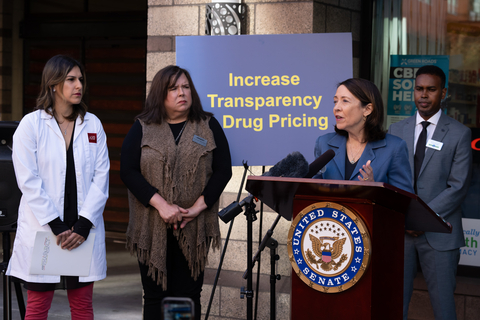 original U.S. Senator Maria Cantwell, second from right, (D-WA) speaks at a press conference introducing pharmacy benefit managers reform while Roshy Mohaghegh, Regional Pharmacy Director, AIDS Healthcare Foundation, left, and Cathleen MacCaul, Advocacy Director, AARP WA second from left, and pharmacy owner Ahmed Ali listen at Othello Station Pharmacy, an independent pharmacy in Seattle, on Thursday, Oct. 12, 2023. Sen. Cantwell introduced Senate Bill 4293, the Pharmacy Benefit Manager Transparency Act of 2022, last year alongside U.S. Senator Chuck Grassley (R-IA) to rein in abuses by pharmacy benefit managers (PBMs) that hurt independent pharmacies and the patients they serve by wielding undue control over the prescription drug and pharmacy businesses nationwide. (Stephen Brashear, AP for AHF)