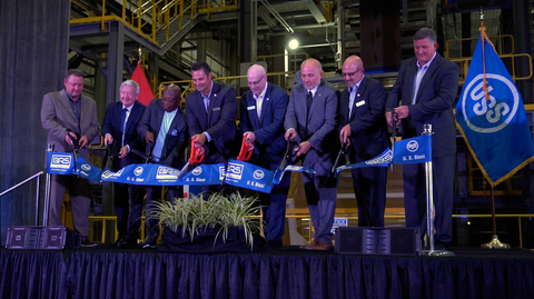 The ribbon is officially cut at the opening of U. S. Steel’s new non-grain oriented electrical steel line. Pictured left to right: Robert Costello, Cold Rolling Manager, Big River Steel Works; Mississippi County Judge John Alan Nelson; Osceola, Arkansas Mayor Joe Harris, Jr.; Daniel Brown, Senior Vice President of Advanced Technology Steelmaking and Chief Operating Officer, Big River Steel Works; U. S. Steel President and Chief Executive Officer David B. Burritt; Arkansas State Representative Jon Milligan; Jim Bell, U. S. Steel Vice President – Construction; and Tommie Kifer, Operations Manager, Big River Steel Works. (Photo: Business Wire)