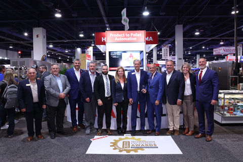 The Harpak-ULMA team accepts its PMMI 2023 Technology Excellence Award at PACK EXPO 2023. From left to right: Ken Forziati, John Sirridge, Josh Becker, Hugh Crouch, Alexander Ouellet, Linda Harlfinger, Kevin Roach, Jim Pittas (PMMI), Jay Siers, Mary Ahlfeld, and Jerry Rundle. (Photo: Business Wire)