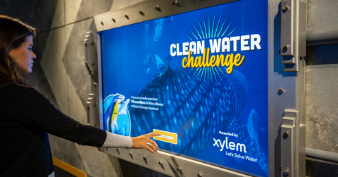 original Xylem debuts the Clean Water Challenge game at Georgia Aquarium’s Ocean Voyager exhibit today to illustrate the importance of sand filtration and water reuse technology for ocean animals. (Photo: Business Wire)
