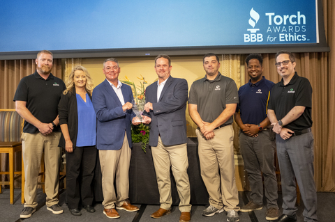 Schaefer Autobody Centers leadership gathers on stage at the Better Business Bureau (BBB) TORCH Awards luncheon at the Missouri Athletic Club in Downtown St. Louis in October 2023. The reception marked the first of two BBB awards the company recently won for putting integrity into action. (Photo: Business Wire)