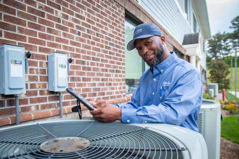 Fort Meade Maintenance Technician reviews the Standard Operating Procedure for HVAC repair. (Photo: Business Wire)