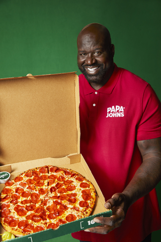 Papa Johns board member, franchisee and former basketball superstar Shaquille O'Neal and the Shaq-a-Roni pizza (Photo: Business Wire)