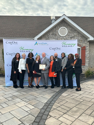 The Harmony Village at CareOne Livingston team is joined by Livingston Mayor Michael M. Vieira to celebrate the grand unit's opening on October 25. (Photo: Business Wire)