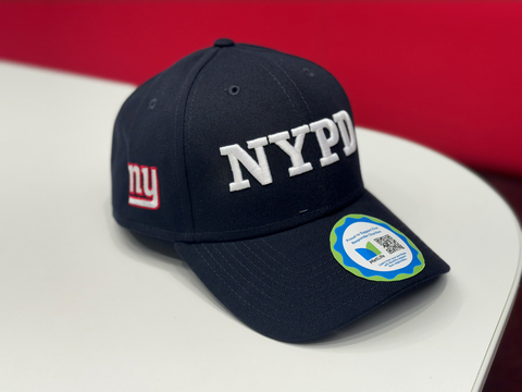 A co-branded NYPD hat available starting Sunday, October 29. (Photo: Business Wire)