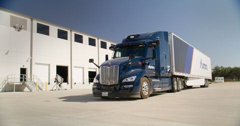 Aurora autonomous truck outside Aurora's new Houston terminal designed to support and service driverless trucks at a commercial scale. (Credit: Aurora)