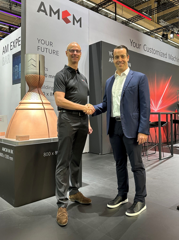 Brian Neff, Founder & CEO of Sintavia, and Martin Bullemer, Managing Director of AMCM announce signing of LOI for Sintavia to become the North American launch customer of the M 8K on November 7, 2023 (Photo: Business Wire)