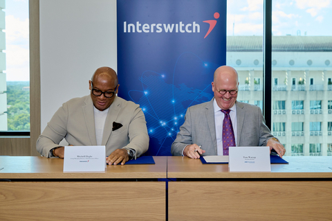 Tom Warsop, CEO, ACI Worldwide (R); Mitchell Elegbe, CEO, Interswitch (L) (Photo: Business Wire)
