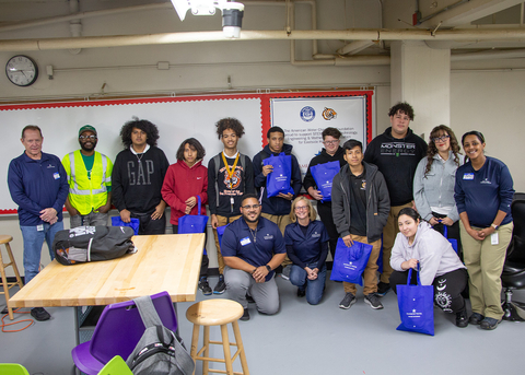 Carrie Williams, President of the American Water Charitable Foundation, and American Water employee volunteers join students and faculty at Eastside High School in Camden, N.J. for a STEM education workshop. (Photo: Business Wire)