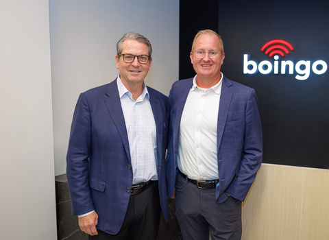 Boingo Wireless CEO Mike Finley and Mayor of Frisco, Texas Jeff Cheney celebrate the opening of Boingo’s new headquarters. (Photo: Business Wire)