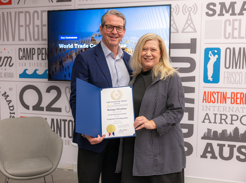 Janie Havel, North Texas Representative for the Office of Gov. Greg Abbott, presented Boingo Wireless CEO Mike Finley with a proclamation for establishing the company’s global headquarters in Texas. (Photo: Business Wire)