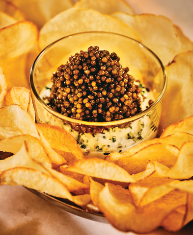 Potato Chips & Crème Fraîche with Caviar at the Champagne & Caviar Bar (Photo: Business Wire)