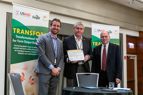 International Poultry Council leaders Nicolo Cinotti, Secretary General, Robin Horel, President, and Dennis Erpelding, TRANSFORM Lead, recognize private sector leadership in adopting antimicrobial use stewardship principles at an industry event in Chicago, Il (Photo: Business Wire)
