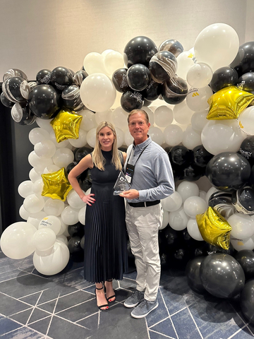 thumbnail Check City accepting the Activa Award (Photo: Business Wire)