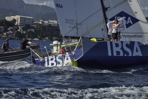 Transat Jacques Vabre: Alberto Bona and Pablo Santurde del Arco on the Class40 IBSA after crossing the finish line in Fort-de-France, Martinique ( ©IBSA | Beppe Raso )