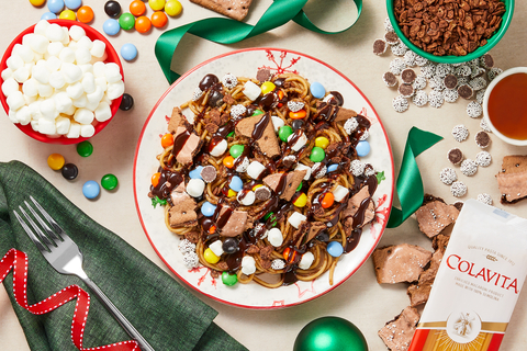 Staying true to the over-the-top dish seen in Elf, the Buddy the Elf™ Spaghetti meal kit features Colavita spaghetti along with an array of sweet toppings like maple syrup, chocolate syrup, marshmallows, chocolate nonpareil candies, and chocolate frosted pastries. (Photo: Business Wire)