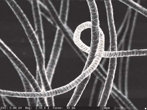 Scanning Electron Microscopic view of fibers after digital scouring with MLSE technology Photo exclusive property of MTIX, Ltd. All rights reserved @2023 www.mti-x.com