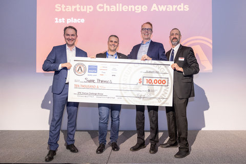Swave Photonics were the 2023 SPIE Startup Challenge champions. From left, Jenoptik’s Ralf Kuschnereit, Swave Co-Founder and Chief Product Officer Theo Marescaux, Swave CEO Mike Noonen, and 2023 SPIE Vice President Peter de Groot. Credit: Joey Cobbs.