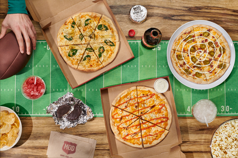 MOD Pizza today announced the launch of the Tailgate Trio, three new pizzas inspired by some of the most popular and craveable game day appetizers like buffalo wings, bacon jalapeño poppers, and spinach artichoke dip. (Photo: Business Wire)