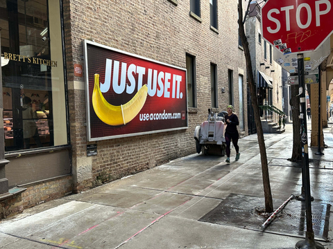 AHF's “Just Use It” billboard campaign now is running in three new cities – Chicago, New York City, and Miami – after several national out-of-home advertising companies refused the artwork back in August. The billboards feature a condom-covered banana with the “Just Use It” slogan and the “useacondom.com URL." One seen here is adjacent to Brett's Kitchen on the corner of Superior St. and Franklin St. in Chicago, IL 60654 (Photo: Business Wire)