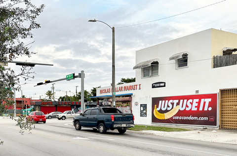 original AHF's “Just Use It” billboard campaign is now running in three new cities – Miami, Chicago, and New York City – after several national out-of-home advertising companies refused the artwork back in August. The billboards feature a condom-covered banana with the “Just Use It” slogan and the “useacondom.com” URL. This billboard in Miami is at NW 22nd Ave & NW 28th St (until 12/24/23). (Photo: Business Wire)