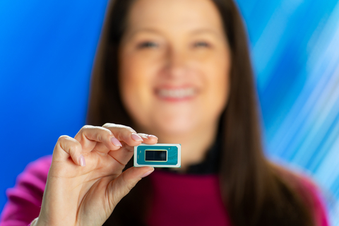 Michelle Johnston Holthaus, executive vice president and general manager of the Client Computing Group at Intel, holds the Intel Core Ultra mobile processor launched Dec. 14, 2023. (Credit: Intel Corporation)