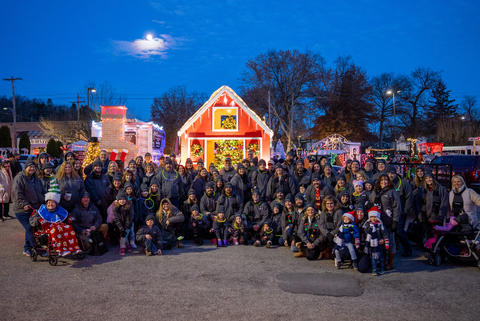 The Peoples Natural Gas team poses for a photo before the 2023 Butler (Pa.) Spirit of Christmas Parade.