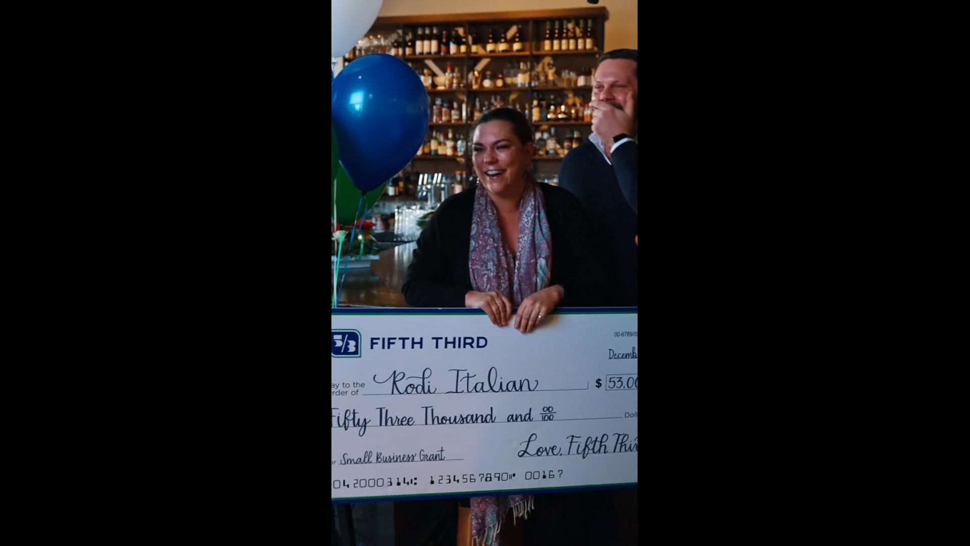 Fifth Third Cincinnati Regional President Tim Elsbrock and the “prize patrol” award RODI Italian with a small business grant.