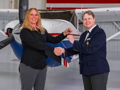 Stacie Townsend, vice president Textron Aviation special missions program management passes the keys to Brig. Gen. Regena Aye, national vice commander Civil Air Patrol (Photo: Business Wire)
