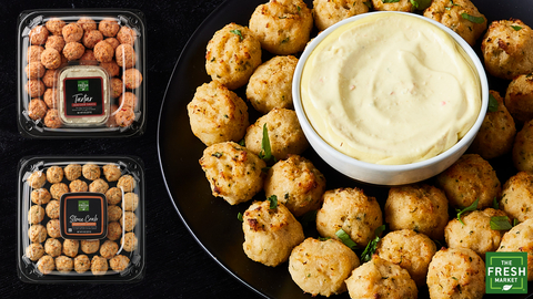 original The Fresh Market's all-new Mini Maryland Crab Cake and Mini Ultimate Crab Cake Platters are full of flavor and meaty goodness with 70% lump and special crab meat, along with simple ingredients to enhance the crab’s delicate notes. Each platter includes The Fresh Market's Stone Crab Mustard Sauce for dipping. The specialty fresh food retailer also just introduced its new Mini Wild Salmon Cake Platter, which is made with a generous amount of wild sockeye salmon meat, just the right amount of simple seasonings, and includes The Fresh Market Tartar Sauce for dipping. Just heat, dip, and enjoy! (Photo: The Fresh Market)