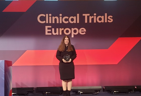 Dr. Christina Brennan accepting the Clinical Trials Lifetime Achievement Award in Spain. (Credit: Feinstein Institutes)