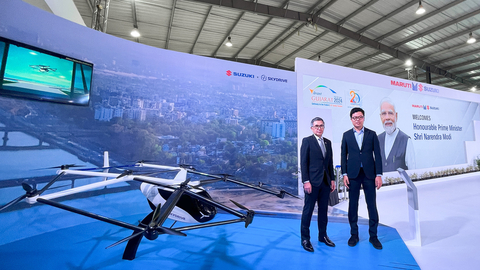 Left: Toshihiro Suzuki, Representative Director and President of Suzuki, Right: Tomohiro Fukuzawa, CEO of SkyDrive in front of 20% scaled SKYDRIVE (SD-05) exhibition (Photo: Business Wire)