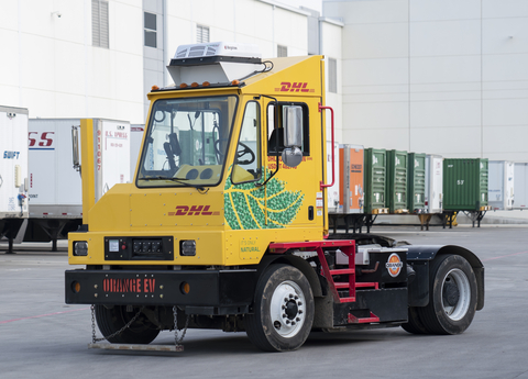 Orange EV electric yard trucks are now deployed to more than 30 DHL Supply Chain sites across the country, and the company has committed to both phasing out diesel yard trucks by 2025 and reducing its logistics-related greenhouse gas emissions to net zero by 2050. (Photo: Business Wire)