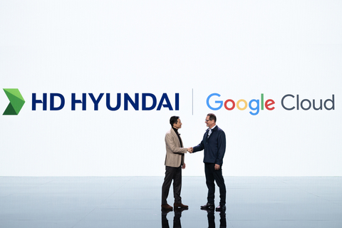 HD Hyundai Vice Chairman Kisun Chung is shaking hands with Philip Moyer, Google Cloud AI Business Global Vice President, who was also a guest speaker on the keynote at CES 2024. (Left-Kisun Chung, Vice Chairman of HD Hyundai, Right-Philip Moyer, Google Cloud AI Business Global Vice President) (Photo: Business Wire)