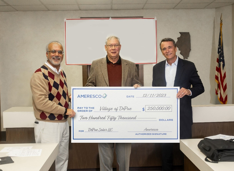 Ameresco representatives present check for one time donation to the Village of DePue as a part of the project for beneficial reuse of the landfill and community support of clean energy. (Photo: Business Wire)