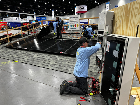 Solar Games participant installs Electriq Power's PowerPod 2 in 2024 Solar Games competition. (Photo: Business Wire)