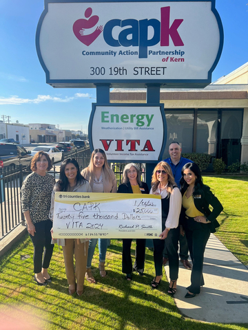 Tri Counties Bank presents a <money>$25,000</money> check to Community Action Partnership of Kern (CAPK), for the 2024 Volunteer Income Tax Assistance (VITA) program. Pictured in this image from left to right: Catherine Anspach, Director of Development at CAPK; Pritika Ram, Chief Business Development Officer at CAPK; Jacquelyn Guerra, Program Manager at CAPK; Elvia Hernandez, Branch Manager at Tri Counties Bank; Rose Pereirra, Community Development Officer at Tri Counties Bank, Freddy Hernandez, Director of Youth & Community Services for CAPK, and Sara Martinez, Business Development Manager at Tri Counties Bank (Photo: Business Wire)