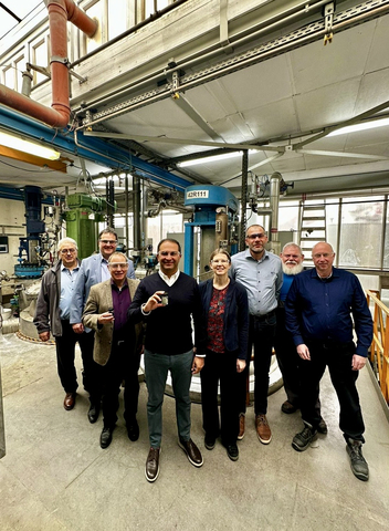 Vikram Handa, Managing Director, Epsilon Advanced Materials (center), stands with employees at the lithium-ion phosphate (LFP) cathode active material technology center in Moosburg, Germany. Epsilon Advanced Materials acquired the facility, positioning the company to lead the electric vehicle battery industry in cathode material manufacturing. (Photo: Business Wire)