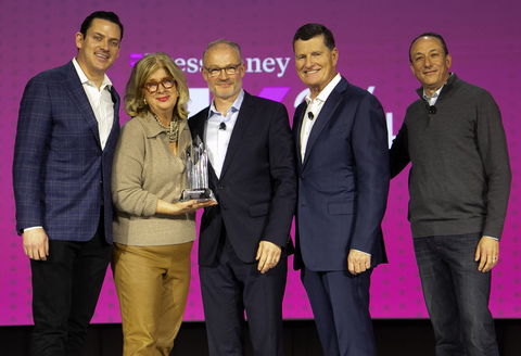 original Northwell Health’s Chief Experience Officer Sven Gierlinger (center) poses with the Press Ganey team at its HX24 conference. (Credit: Adam Shea from Adam Shea Photography)