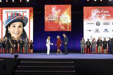 thumbnail Rita Case receives the TIME Dealer of the Year Award from Jessica Sibley, CEO of TIME, and Doug Timmerman, Interim CEO of Ally Financial and President of Ally’s Dealer Financial Services with the finalists looking on. (Photo Credit: Ally Financial)