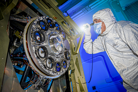 A Ball Aerospace specialist inspects components of the Nancy Grace Roman Space Telescope. (Photo: Business Wire)