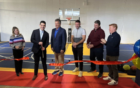 Representatives from New Perceptions, Toyota Boshoku America and Cincinnati Sportscapes join the ribbon cutting for the new sports court. (Photo: Business Wire)
