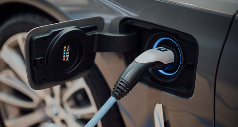 original Charging an Electric Vehicle (Photo: Business Wire)