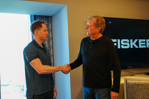 Robert Ourisman, President and CEO of the Ourisman Automotive Group, with Fisker CEO Henrik Fisker after signing at NADA in Las Vegas. (Photo: Fisker Inc.)