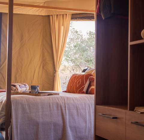 SSRS bed: Twenty luxurious glamping suites sleep up to 6 people (Photo: Business Wire)